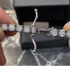 Moissanite tennis kettingklem met ronde steentjes in zilverkleurige ketting