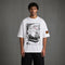 Wit oversized boxy T-shirt met grote stripachtige print op de voorkant