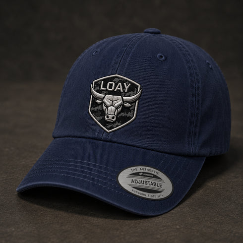 Unisex katoenen pet in navy met geborduurde LOAY schildpatch en verstelbaar label