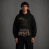 Zwarte oversized hoodie met capuchon en grote oogprint op de borst