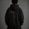 Zwarte hoodie met capuchon en grote zwarte-rondom oogprint op de rug.