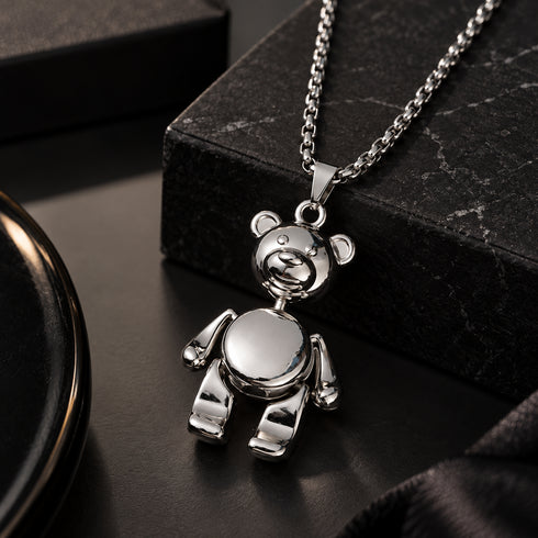 silver teddy bear pendant necklace close up