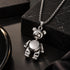 silver teddy bear pendant necklace close up